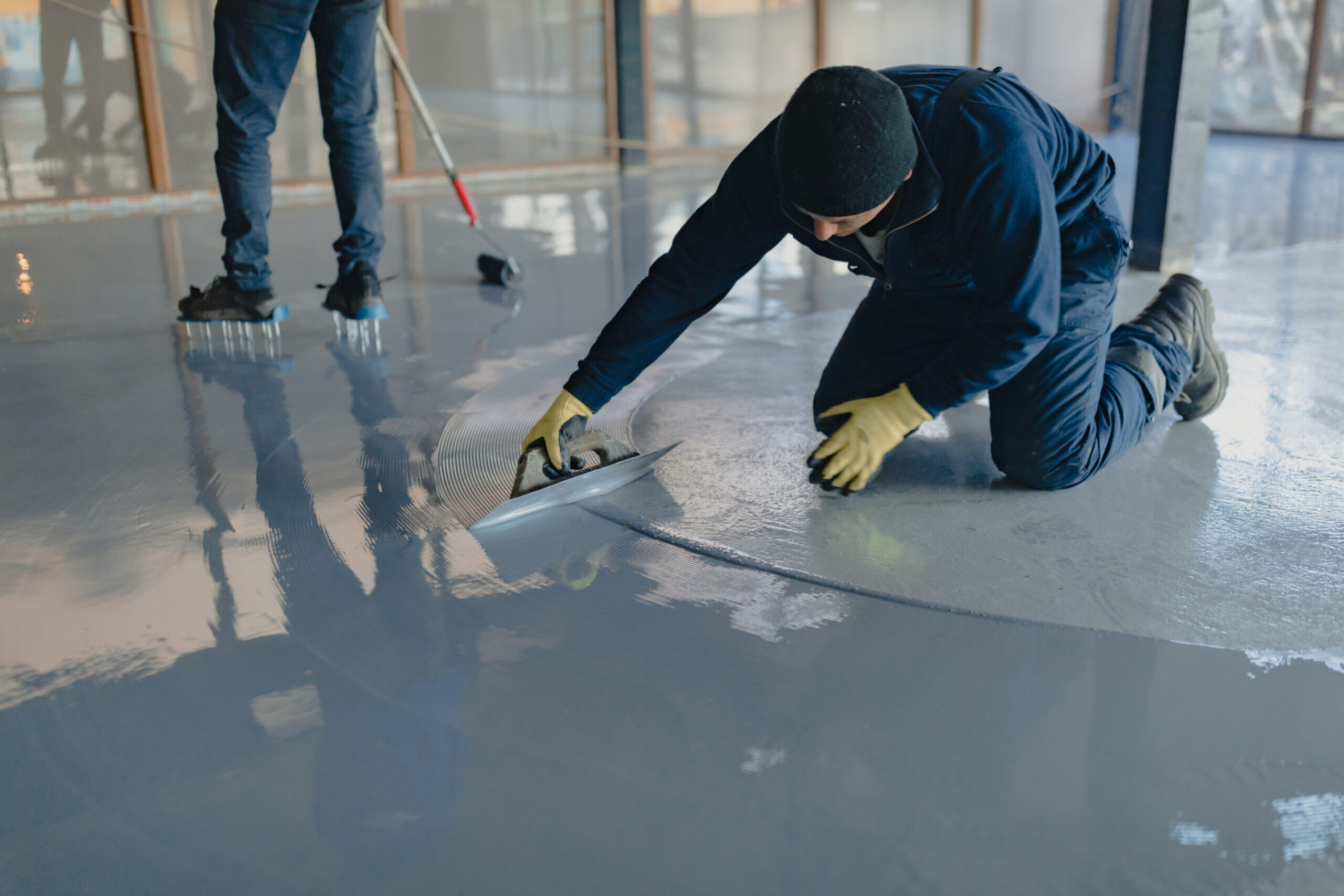 Garage floor coating install in progress in Edmond Oklahoma